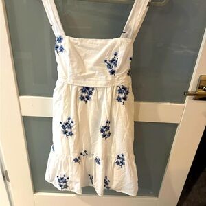 White dress with blue flowers